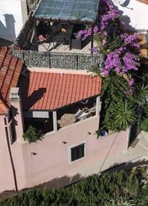 an overhead view of a building with a red roof at Bougainvillea in Ston