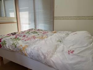 Postel nebo postele na pokoji v ubytování PLATINUM kitaoji