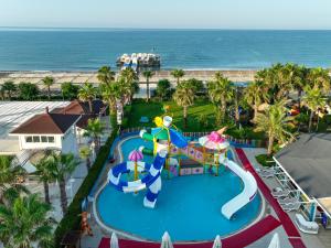 an aerial view of a water park at the beach at Orange County Belek in Belek