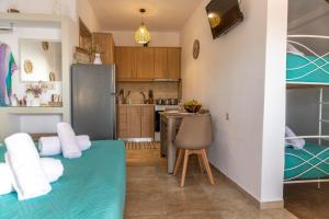 Kuchyň nebo kuchyňský kout v ubytování Georgia Apartment