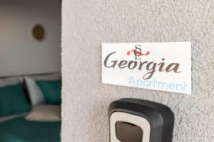 Certifikát, hodnocení, plakát nebo jiný dokument vystavený v ubytování Georgia Apartment