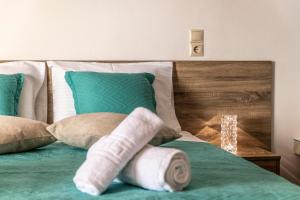 Postel nebo postele na pokoji v ubytování Georgia Apartment