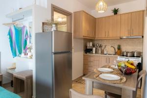 Kuchyň nebo kuchyňský kout v ubytování Georgia Apartment