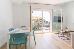 Μια τηλεόραση ή/και κέντρο ψυχαγωγίας στο Apartamentos Areas Do Mar - APART 1 Y 2