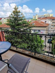 a christmas tree sitting on top of a balcony at Цар Калоян in Primorsko