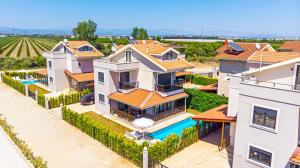 an aerial view of a house with a swimming pool at Paradise Town Villa Cordelia 100 MBPS free wifi in Belek