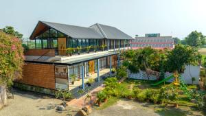an overhead view of a building with a garden at HOTEL NATURE AGRO RESORT in Sangamner