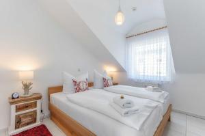 Ένα ή περισσότερα κρεβάτια σε δωμάτιο στο Maisonette Amalie