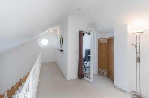 Μια τηλεόραση ή/και κέντρο ψυχαγωγίας στο Maisonette Amalie +6 φωτογραφίες