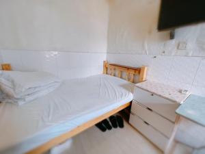 Letto o letti in una camera di 泰豪賓館