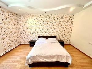 Ліжко або ліжка в номері Guesthouse Mtkvari