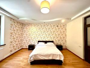 Ліжко або ліжка в номері Guesthouse Mtkvari