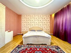 Ліжко або ліжка в номері Guesthouse Mtkvari