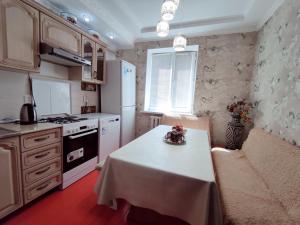Kuchyň nebo kuchyňský kout v ubytování Guest House Adimi