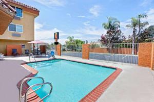 The swimming pool at or close to Super 8 by Wyndham Cypress Buena Park Area