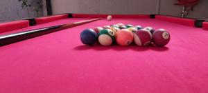 a group of cue balls on a pool table at The Royal Prime Guest Lodge in Centurion