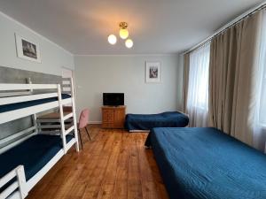 Postel nebo postele na pokoji v ubytování Pod Lipami