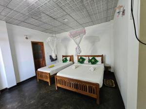 Postel nebo postele na pokoji v ubytování Enthral View Homestay