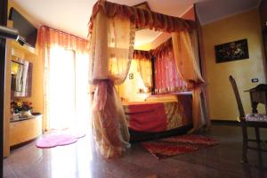 Postel nebo postele na pokoji v ubytování B & B L'almanacco