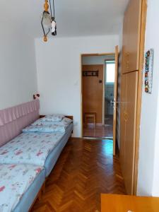 Posteľ alebo postele v izbe v ubytovaní Krisztina apartman