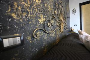 Postel nebo postele na pokoji v ubytování B & B L'almanacco