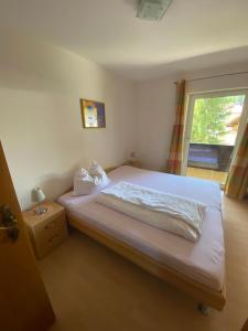 Letto o letti in una camera di Haus Sonnenspitze - Fam. Nessler