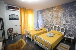Postel nebo postele na pokoji v ubytování B & B L'almanacco