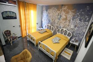 Postel nebo postele na pokoji v ubytování B & B L'almanacco
