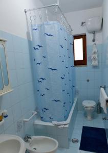 Koupelna v ubytování La casa dei Nonni + 21 fotografií