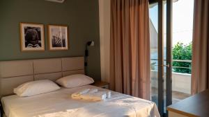 Postel nebo postele na pokoji v ubytování suite apartment Αdonis