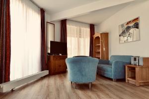TV a/nebo společenská místnost v ubytování Hotel Residenz WALDOASE