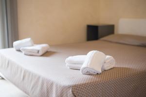 Posteľ alebo postele v izbe v ubytovaní Lazise Boutique Apartment Lago e Relax