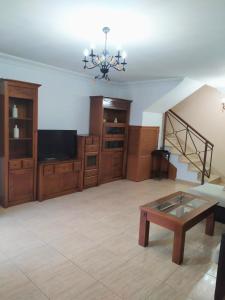 A television and/or entertainment centre at Casa Sagittarius Ocean view