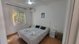 Postel nebo postele na pokoji v ubytování Apartamento Burriana Beach