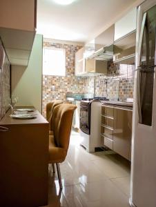Kuchyň nebo kuchyňský kout v ubytování Apartamento Aconchegante em Paulo Afonso