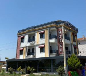 a building with a sign on the side of it at BossPort Hotel in Tekirdag