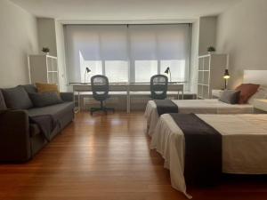 Posteľ alebo postele v izbe v ubytovaní Casa centro Sabadell a 20Km de Barcelona ideal Familias y Grupo Amigos