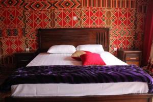 Posteľ alebo postele v izbe v ubytovaní Sami Al Muzna Rum Camp