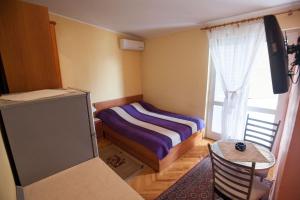 Postel nebo postele na pokoji v ubytování Vila Vida