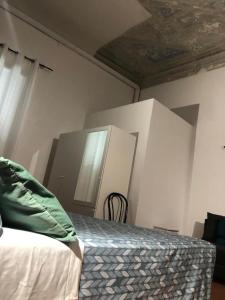 Postel nebo postele na pokoji v ubytování Relais Florence