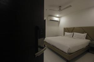 Postel nebo postele na pokoji v ubytování Hotel SSR GRAND