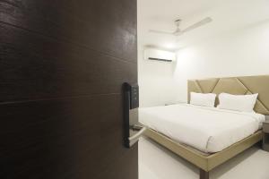 Postel nebo postele na pokoji v ubytování Hotel SSR GRAND