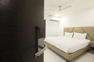 Postel nebo postele na pokoji v ubytování Hotel SSR GRAND