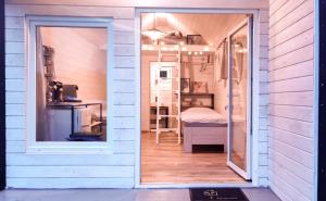 Kuchyň nebo kuchyňský kout v ubytování Tiny House + 8 fotografií