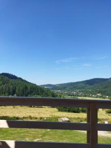 a view of a field from a fence at Domek u Sołtyska in Rajcza