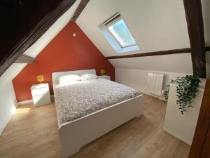 Ένα ή περισσότερα κρεβάτια σε δωμάτιο στο Le Soleil Levant