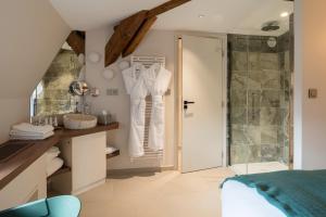 a bathroom with a sink and a shower at Belle Epoque in Aix-les-Bains