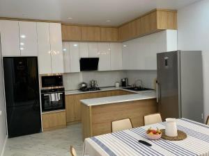Kuchyň nebo kuchyňský kout v ubytování Guesthouse Mtsvane Koncxi 22