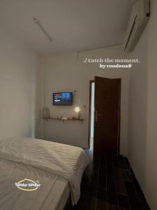 Postel nebo postele na pokoji v ubytování Tiinder Hotel