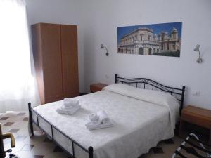 Postel nebo postele na pokoji v ubytování Casa NILLA